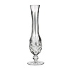 A sublime vase in elegant crystal hosts a simple rose or tulip for a classic display of grace and beauty.