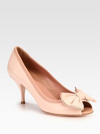 A perfectly-placed bow tops this classic peep toe silhouette in supple Italian leather. Self-covered heel, 3 (75mm)Leather upperPeep toeLeather lining and solePadded insoleMade in Italy A perfectly-placed bow tops this classic peep toe silhouette in supple Italian leather. Self-covered heel, 3 (75mm)Leather upperPeep toeLeather lining and solePadded insoleMade in Italy