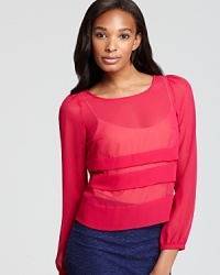 Tiered for style, this BCBGeneration blouse is sheer genius in elegant chiffon. Tiered for style, this BCBGeneration blouse is sheer genius in elegant chiffon.