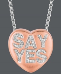 Ready to say your I do's? Sweethearts' adorable heart-shaped pendant expresses more that just great style with the words SAY YES spelled out in round-cut diamonds (1/6 ct. t.w.) across the surface. Pendant crafted in 14k rose gold over sterling silver. Copyright © 2011 New England Confectionery Company. Approximate length: 16 inches + 2-inch extender. Approximate drop: 5/8 inch. Ready to say your I do's? Sweethearts' adorable heart-shaped pendant expresses more that just great style with the words SAY YES spelled out in round-cut diamonds (1/6 ct. t.w.) across the surface. Pendant crafted in 14k rose gold over sterling silver. Copyright © 2011 New England Confectionery Company. Approximate length: 16 inches + 2-inch extender. Approximate drop: 5/8 inch.