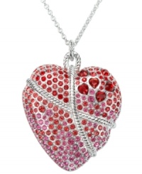 A sweet sentiment. Swarovski's long Roxanne pendant sparkles in light siam and rose crystal. the heart motif is romantically wrapped in a refined rope effect. Crafted in silver tone mixed metal. Approximate length: 29-1/2 inches. Approximate drop: 1-1/5 inches. A sweet sentiment. Swarovski's long Roxanne pendant sparkles in light siam and rose crystal. the heart motif is romantically wrapped in a refined rope effect. Crafted in silver tone mixed metal. Approximate length: 29-1/2 inches. Approximate drop: 1-1/5 inches.