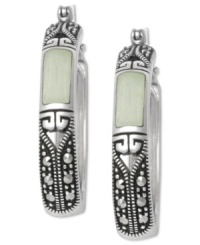 A pair with panache. Genevieve & Grace's oval hoop earrings, set in sterling silver, give jade accents and marcasite prominence for a look that's stunning. Approximate diameter: 1 inch. A pair with panache. Genevieve & Grace's oval hoop earrings, set in sterling silver, give jade accents and marcasite prominence for a look that's stunning. Approximate diameter: 1 inch.