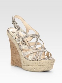 Elevated by a cork wedge and espadrille platform, adjustable python-embossed leather straps weave their way around the foot. Cork wedge, 5½ (140mm)Cork and hemp-covered platform, 1½ (40mm)Compares to a 4 heel (100mm)Python-embossed leather upperLeather liningRubber solePadded insoleImportedOUR FIT MODEL RECOMMENDS ordering true size. Elevated by a cork wedge and espadrille platform, adjustable python-embossed leather straps weave their way around the foot. Cork wedge, 5½ (140mm)Cork and hemp-covered platform, 1½ (40mm)Compares to a 4 heel (100mm)Python-embossed leather upperLeather liningRubber solePadded insoleImportedOUR FIT MODEL RECOMMENDS ordering true size.