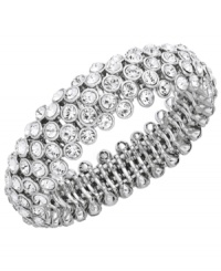 Give your style a sparkling pick-me-up. Charter Club's slip-on bangle features clear glass accents set in silver tone mixed metal. Bracelet stretches to fit wrist. Approximate diameter: 2-1/4 inches. Give your style a sparkling pick-me-up. Charter Club's slip-on bangle features clear glass accents set in silver tone mixed metal. Bracelet stretches to fit wrist. Approximate diameter: 2-1/4 inches.