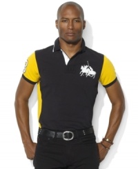 A custom-fitting jersey-inspired shirt is rendered in breathable mesh cotton and accented with Ralph Lauren's Dual Match players for timeless appeal. A custom-fitting jersey-inspired shirt is rendered in breathable mesh cotton and accented with Ralph Lauren's Dual Match players for timeless appeal.