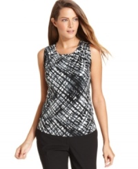 A graphic print makes an understated fashion statement. Pair Calvin Klein's shell with a colorful skirt or pantsuit to add just the right amount of edge. A graphic print makes an understated fashion statement. Pair Calvin Klein's shell with a colorful skirt or pantsuit to add just the right amount of edge.