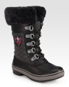 A cold weather favorite in quilted canvas and leather, lined with signature plush shearling. Shaft, 10Leg circumference, 13Canvas and leather upper with shearling trimShearling liningRubber trek solePadded insoleImported