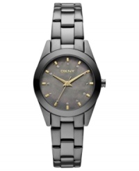 Moody gunmetal hues leave an impression on this DKNY watch. Moody gunmetal hues leave an impression on this DKNY watch.