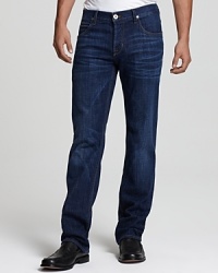 The Wilde jean walks the line between rugged and polished, crafted with a relaxed fit, button fly and orange topstitching. The Wilde jean walks the line between rugged and polished, crafted with a relaxed fit, button fly and orange topstitching.