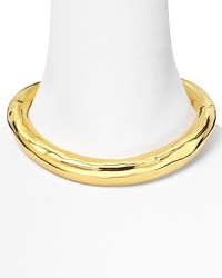 Let Alexis Bittar's striking gold collar lend your look a dose of high-shine chic. In perfect step with the jewels seen on the runways, slip this on to transform a favorite tee-shirt from basic to bold. Let Alexis Bittar's striking gold collar lend your look a dose of high-shine chic. In perfect step with the jewels seen on the runways, slip this on to transform a favorite tee-shirt from basic to bold.
