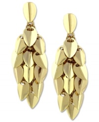 Leaves of gold. Vince Camuto's chandelier earrings make an attractive choice with leaf-shaped clusters in golden tones. Crafted in gold tone mixed metal. Approximate drop: 3-1/4 inches. Leaves of gold. Vince Camuto's chandelier earrings make an attractive choice with leaf-shaped clusters in golden tones. Crafted in gold tone mixed metal. Approximate drop: 3-1/4 inches.