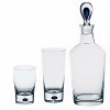 The Intermezzo Blue barware features a dramatic teardrop of blue in the base. Designed by Erika Lagerbielke . Shown from left to right - double old fashion, tumbler, decanter. Also available but not shown: wine carafe.