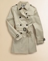 This chic double-breasted silhouette features traditional trench styling and a checked cotton lining.Point collarButton epaulettesButton-down gunflapDouble-breasted button frontLong sleeves with belted cuffsSelf beltRainflapBack ventCottonCotton liningMachine washImported