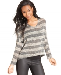 Casual with a wild side, Ultra Flirt's knit top fuses sporty stripes and a relaxed fit with a back of cutouts and lace! Casual with a wild side, Ultra Flirt's knit top fuses sporty stripes and a relaxed fit with a back of cutouts and lace!