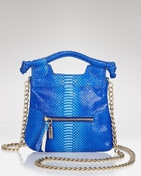 A sized down Foley + Corinna handbag is a petite statement piece in leather, embossed in a glamorous snakeskin pattern. A single zip top pocket sits at the front. A sized down Foley + Corinna handbag is a petite statement piece in leather, embossed in a glamorous snakeskin pattern. A single zip top pocket sits at the front.