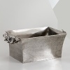 The grand form of a mythical dragon was the muse behind this sculptural party bucket from Natori.