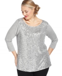 Shimmer this holiday season in Jones New York Signature's three-quarter-sleeve plus size top, flaunting a sequined front. Shimmer this holiday season in Jones New York Signature's three-quarter-sleeve plus size top, flaunting a sequined front.