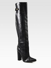 A powerful heel lifts this ultra-tall leather silhouette, fit for an urban warrior. Self-covered heel, 4½ (115mm)Shaft, 20Leg circumference, 15Leather upperPull-on style and strap with snap closuresLeather lining and solePadded insoleImported A powerful heel lifts this ultra-tall leather silhouette, fit for an urban warrior. Self-covered heel, 4½ (115mm)Shaft, 20Leg circumference, 15Leather upperPull-on style and strap with snap closuresLeather lining and solePadded insoleImported