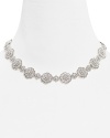 Love: the Nadri Love Knot All Around Necklace encircles you in elegance, with a beautiful, pavé floral motif.