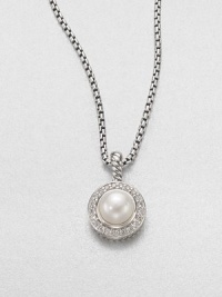 From the Petite Albion Collection. An elegant pearl surrounded with dazzling diamonds set in sleek sterling silver on a box link chain. PearlSterling silverDiamonds, .21 tcwLength, about 17Lobster clasp closureImported