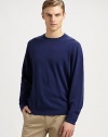 A classic crewneck pullover silhouette, rendered in warm, finespun wool.CrewneckLong sleevesRib-knit cuffs and hemAbout 28 from shoulder to hemWoolHand washImported