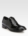 Mirrored patent leather forms this traditional lace-up silhouette, impeccably crafted in Italy. Stacked heel, 1¼ (30mm)Patent leather upperLeather liningRubber solePadded insoleMade in Italy