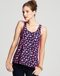 Get ready for your closeup in this Lilly Pulitzer top touting a kitschy kiss print and a contrast back panel. The perfect accessory--a bold red lip. Get ready for your closeup in this Lilly Pulitzer top touting a kitschy kiss print and a contrast back panel. The perfect accessory--a bold red lip.