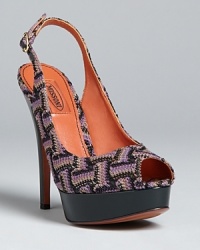 Missoni sets these peep toe platform pumps apart with a signature pattern that will always stay at the height of style. Missoni sets these peep toe platform pumps apart with a signature pattern that will always stay at the height of style.
