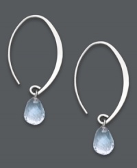 Subtly stunning. Polished hoop earrings receive an added hint of color with a shimmering aquamarine drop (3 ct. t.w.). Open hoop setting crafted in sterling silver. Approximate drop: 1-1/2 inches. Subtly stunning. Polished hoop earrings receive an added hint of color with a shimmering aquamarine drop (3 ct. t.w.). Open hoop setting crafted in sterling silver. Approximate drop: 1-1/2 inches.