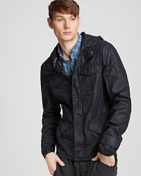 A jacket that weathers the worst, this hooded windbreaker is all about performance and style. A jacket that weathers the worst, this hooded windbreaker is all about performance and style.