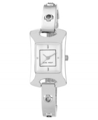 Slip on this sleek bangle watch from Nine West to complement your favorite jewelry. Slip on this sleek bangle watch from Nine West to complement your favorite jewelry.