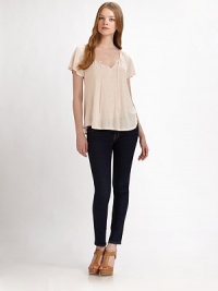A sweet and airy design with delicate embroidery and subtle feminine detailing. Open v-neck with self tie and embroidered trimDropped shouldersShort cap sleevesViscoseMachine washImportedModel shown is 5'10 (177cm) wearing US size Small. A sweet and airy design with delicate embroidery and subtle feminine detailing. Open v-neck with self tie and embroidered trimDropped shouldersShort cap sleevesViscoseMachine washImportedModel shown is 5'10 (177cm) wearing US size Small.