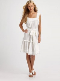 An ultra-feminine coverup with pom pom details and a self-tie waistline for an enviable fit.SleevelessPull-on styleSelf-tie55% linen/45% viscoseDry cleanMade in USA of imported fabric An ultra-feminine coverup with pom pom details and a self-tie waistline for an enviable fit.SleevelessPull-on styleSelf-tie55% linen/45% viscoseDry cleanMade in USA of imported fabric