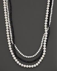 A beautiful blend of fresh water pearl in two sizes and a nested strand of black onyx beads.