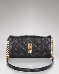 Marc Jacobs' chic quilted leather wallet boasts great versatility with a detachable crossbody strap. Marc Jacobs' chic quilted leather wallet boasts great versatility with a detachable crossbody strap.