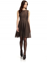 THE LOOKCrewneck Back zip with hook and eye closureSleevelessSheer panels at necklineSeam detailsBanded waistFull skirtTHE FITAbout 38 from shoulder to hemTHE MATERIAL52% rayon/48% polyamideFully linedCARE & ORIGINDry clean ImportedModel shown is 5'10 (178cm) wearing US size 4. THE LOOKCrewneck Back zip with hook and eye closureSleevelessSheer panels at necklineSeam detailsBanded waistFull skirtTHE FITAbout 38 from shoulder to hemTHE MATERIAL52% rayon/48% polyamideFully linedCARE & ORIGINDry clean ImportedModel shown is 5'10 (178cm) wearing US size 4.