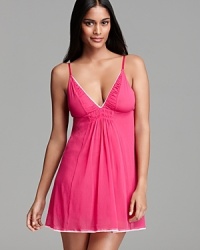 OnGossamer's pretty-in-pink nightie lends feminine flair with a shirred neckline and scalloped trim. OnGossamer's pretty-in-pink nightie lends feminine flair with a shirred neckline and scalloped trim.
