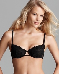 A lacy balconette with a sultry center cut-out, this Calvin Klein Underwear bra packs a haute punch. Style #F3542. A lacy balconette with a sultry center cut-out, this Calvin Klein Underwear bra packs a haute punch. Style #F3542.