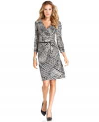 Tahari by ASL reinvigorates a herringbone motif with this exaggerated spin on the pattern, set on a sleek, belted silhouette. Tahari by ASL reinvigorates a herringbone motif with this exaggerated spin on the pattern, set on a sleek, belted silhouette.