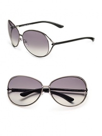 Round modified metal frames with open-end lens and tubular temples. Available in shiny gunmetal with grey gradient lens.100% UV protection Made in Italy Round modified metal frames with open-end lens and tubular temples. Available in shiny gunmetal with grey gradient lens.100% UV protection Made in Italy