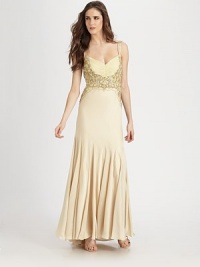 Intricate, strategic beading emphasizes the ultra-feminine silhouette of this floor-length style.Shoulder strapsSweetheart necklineRuched, beaded bodiceLow scooped backConcealed side zipFully linedAbout 45 from natural waistPolyesterSpot cleanImportedModel shown is 5'11 (180cm) wearing US size 4. 