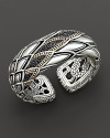 From the Naga collection, this kick cuff is accented with black sapphires. Designed by John Hardy.