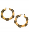 Rounding it out. These earrings, crafted of 14k gold-plated, nickel-free mixed metal, from T Tahari are adorned with a rope motif for texture. Approximate diameter: 1-1/4 inches.