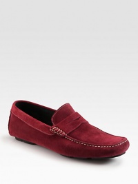 Soft suede penny loafer with intricate contrast stitching and a convenient rubber sole. Suede upperLeather liningPadded insoleSuede and rubber soleMade in Italy