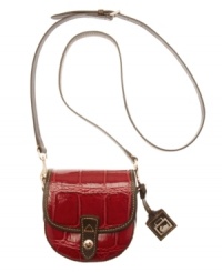 Croc embossing and contrast stitching add dimension to the rounded silhouette of this elegant leather (and perfectly mini!) crossbody purse from Dooney & Bourke. Croc embossing and contrast stitching add dimension to the rounded silhouette of this elegant leather (and perfectly mini!) crossbody purse from Dooney & Bourke.