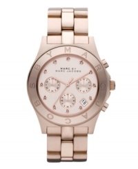 Feminize your everyday style with this lovely Blade watch by Marc by Marc Jacobs. Rose-gold ion-plated stainless steel bracelet and round case. Bezel etched with logo. Rose-gold tone chronograph dial features crystal accent markers, three subdials, date window, three hands and logo. Quartz movement. Water resistant to 50 meters. Two-year limited warranty. Feminize your everyday style with this lovely Blade watch by Marc by Marc Jacobs. Rose-gold ion-plated stainless steel bracelet and round case. Bezel etched with logo. Rose-gold tone chronograph dial features crystal accent markers, three subdials, date window, three hands and logo. Quartz movement. Water resistant to 50 meters. Two-year limited warranty.