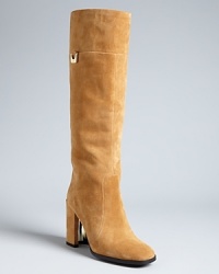 DIANE von FURSTENBERG's so '70s, so now style is seen perfectly in these tall suede boots, that will work with so many ready-to-wear favorites. Cutout gold heel accents give the look a bit of extra polish. DIANE von FURSTENBERG's so '70s, so now style is seen perfectly in these tall suede boots, that will work with so many ready-to-wear favorites. Cutout gold heel accents give the look a bit of extra polish.