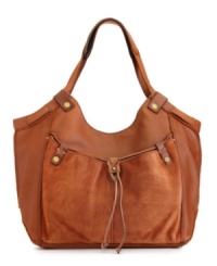 Give any laid-back look an instant artisan appeal with this boho-chic silhouette from Lucky Brand. Butter-soft leather, burnished golden hardware and drawstring detail add creative cache, for a look that imparts a free-spirited feeling. Give any laid-back look an instant artisan appeal with this boho-chic silhouette from Lucky Brand. Butter-soft leather, burnished golden hardware and drawstring detail add creative cache, for a look that imparts a free-spirited feeling.
