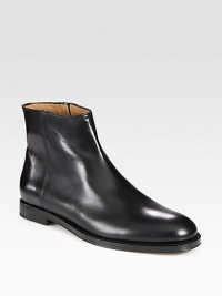 Modern and refined elements merge together to create a sleek '60s-inspired silhouette with an updated rounded toe. Calf leather upperLeather liningPadded insoleLeather soleMade in Italy Modern and refined elements merge together to create a sleek '60s-inspired silhouette with an updated rounded toe. Calf leather upperLeather liningPadded insoleLeather soleMade in Italy