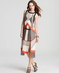 This BCBGMAXAZRIA dress, featuring finely pleated front and back panels, masters the color-block trend in a fresh, innovative way. This BCBGMAXAZRIA dress, featuring finely pleated front and back panels, masters the color-block trend in a fresh, innovative way.
